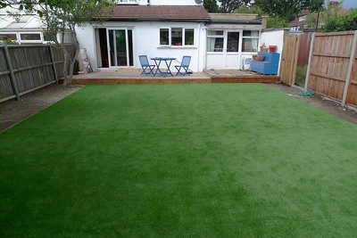 Beautiful sythetic lawn in the backgarden