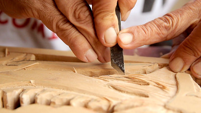 A close-up of a woodworking tool's blade