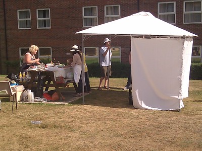 Outdoor salad preparation by a family