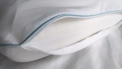 a-close-up-image-of-a-white-cushion-for-body-support